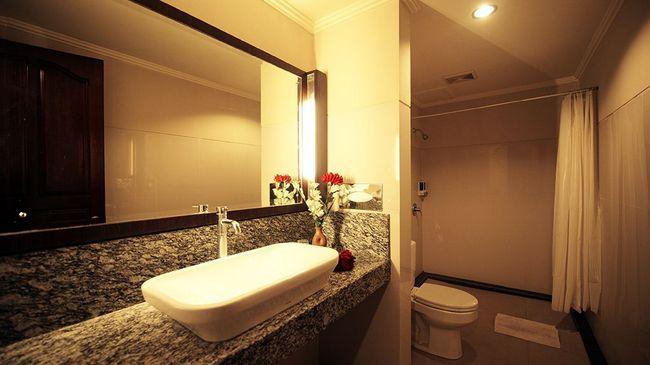 Urbanview Hotel Taman Suci Denpasar Zimmer foto